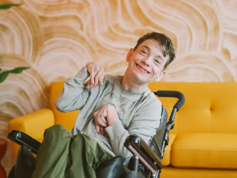 Disabled man smiling at camera